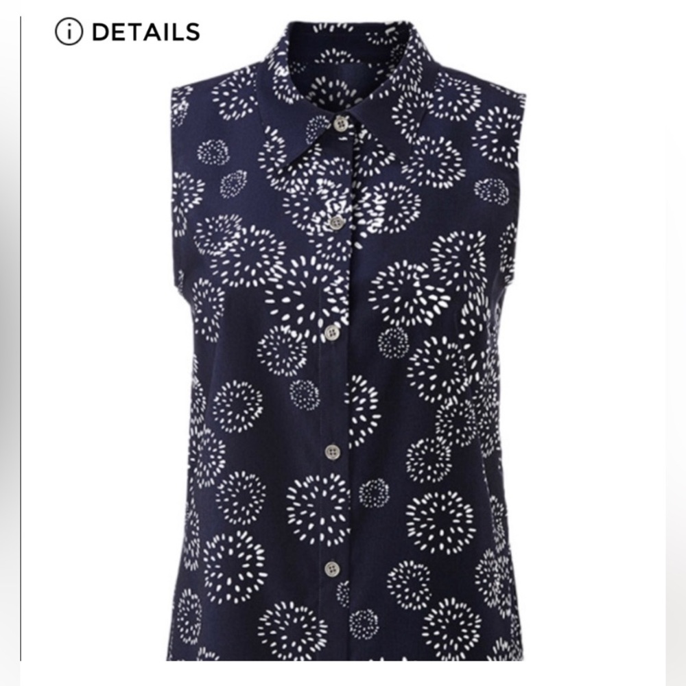 Cabi #5215 Wish Top. Size small. Navy and white peplum back.